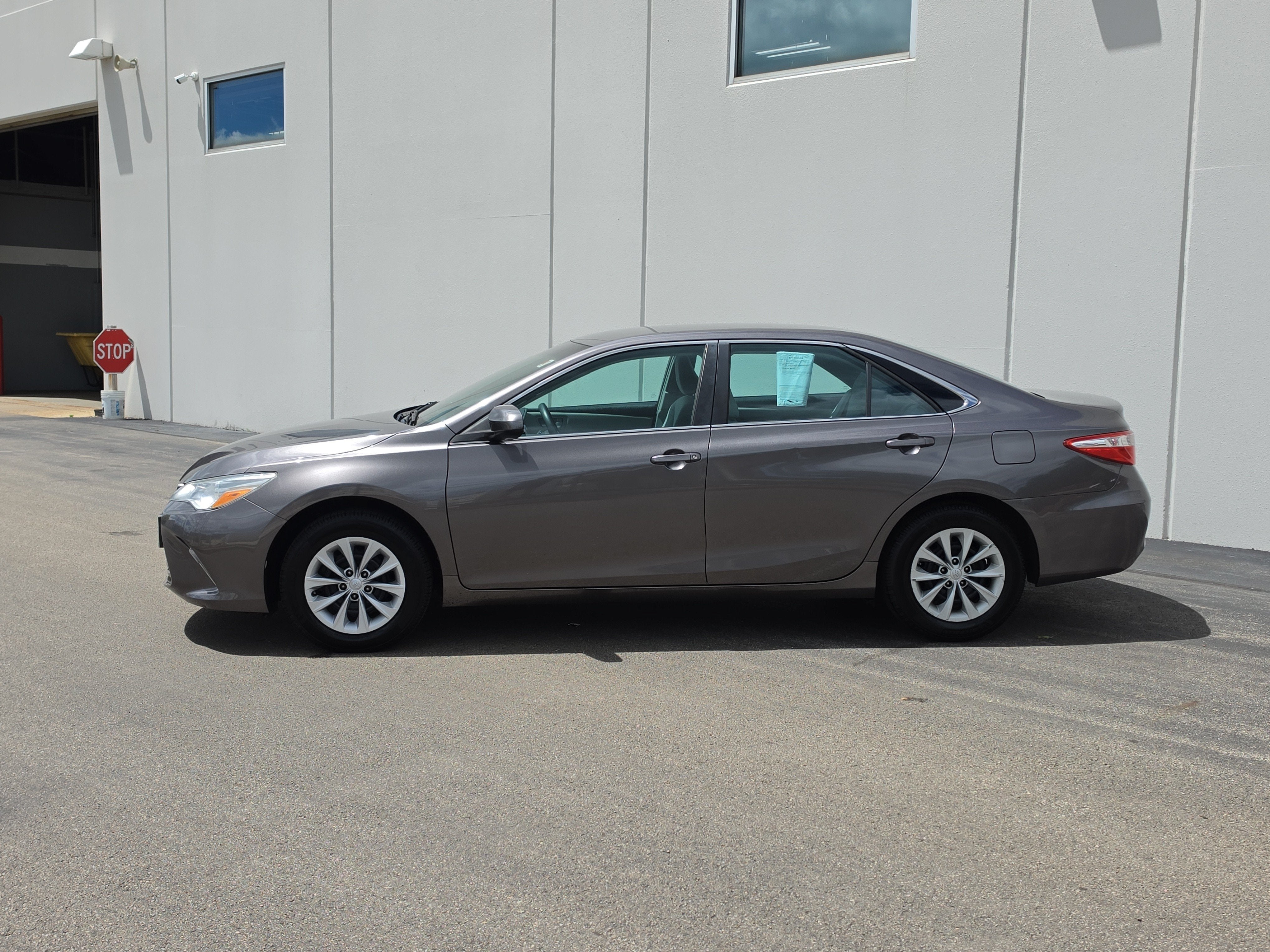 2017 Toyota Camry — rear three-quarter view