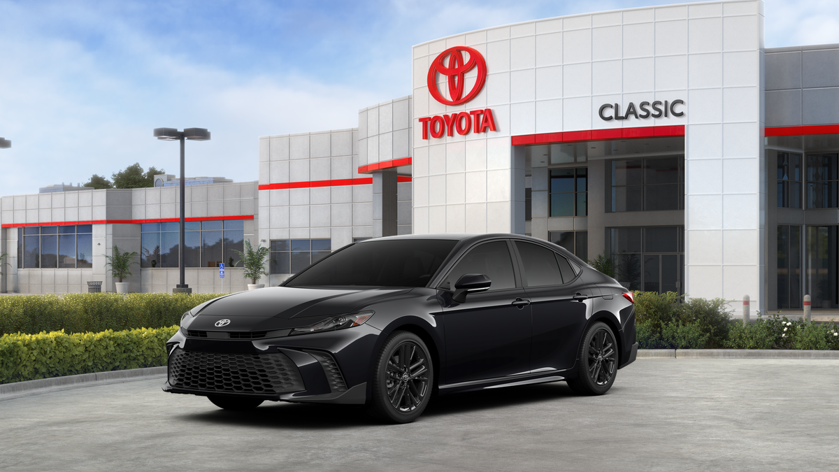 2026 Toyota Camry SE AWD in Midnight Black Metallic — front three-quarter view