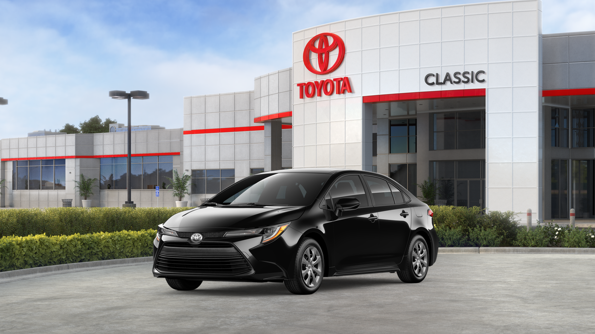 2026 Toyota Corolla LE in Midnight Black Metallic — front three-quarter view