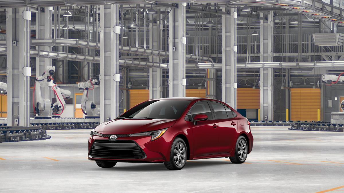 2026 Toyota Corolla LE in Ruby Flare Pearl <a role='button' class='viewDgDisclaimersButton' data-toggle='modal'...